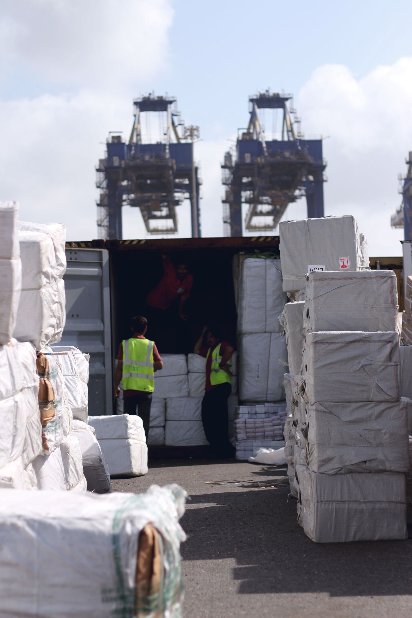 Floor-loaded container before destuffing
